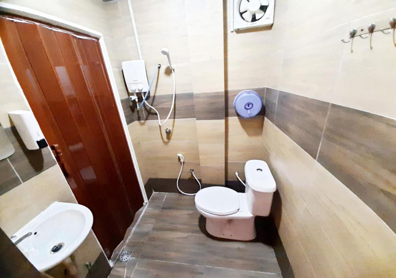 Mn Ferringhi Inn Бату Феринги Екстериор снимка